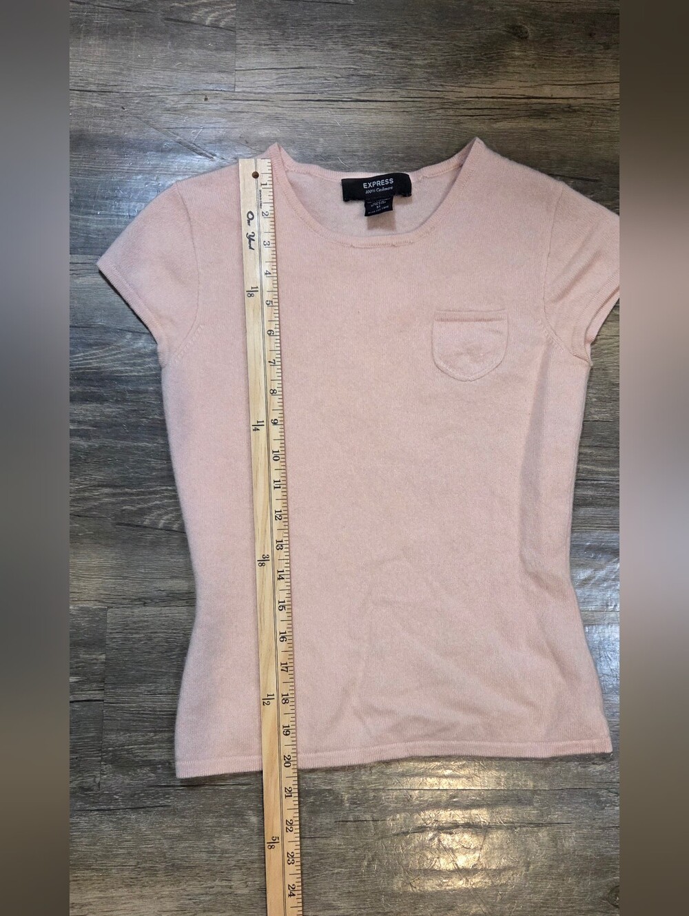 Express 100% Cashmere cap-sleeve knit shirt featuring a front chest pocket